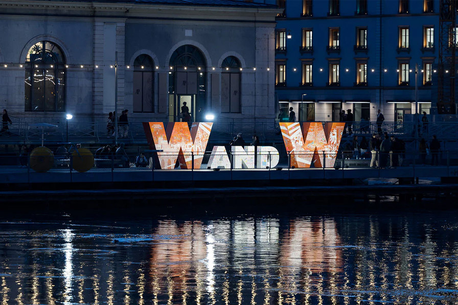 Instalación luminosa de Watches and Wonders junto al lago, en Ginebra, durante la feria de abril de 2026