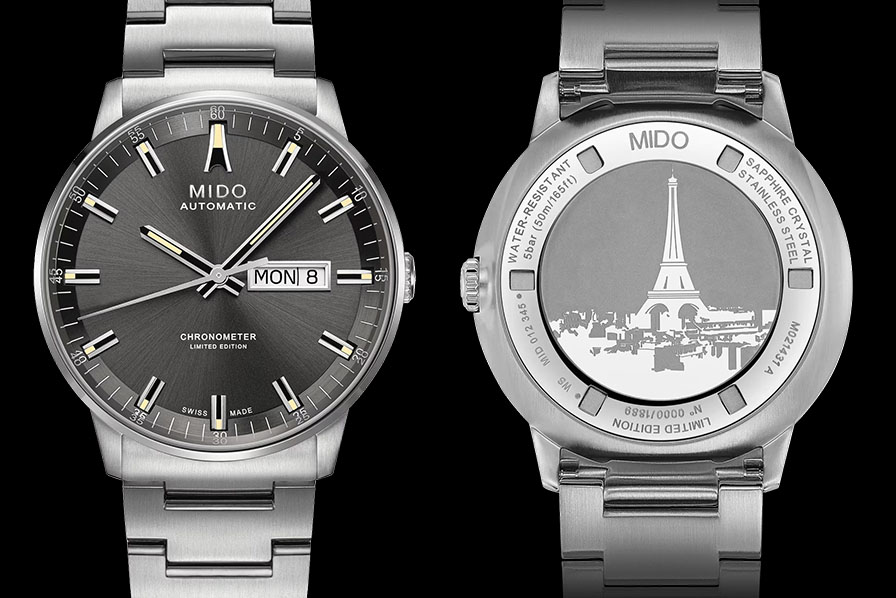 Macro del índice de las 12 en un reloj Mido Commander